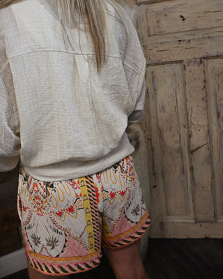Back view of lightweight boho print women's shorts featuring a colorful tribal-inspired pattern, relaxed fit, and vacation-ready style for effortless summer outfits.
