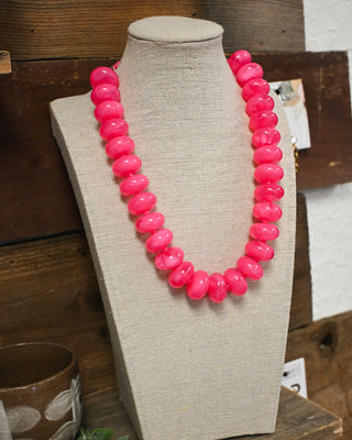 Hot pink chunky bead necklace, bold statement jewelry for women, vibrant boutique accessory perfect for adding a fun pop of color to any outfit.