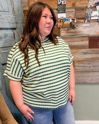 Chic plus size striped top in green and white with soft textured material and relaxed silhouette for casual wear
