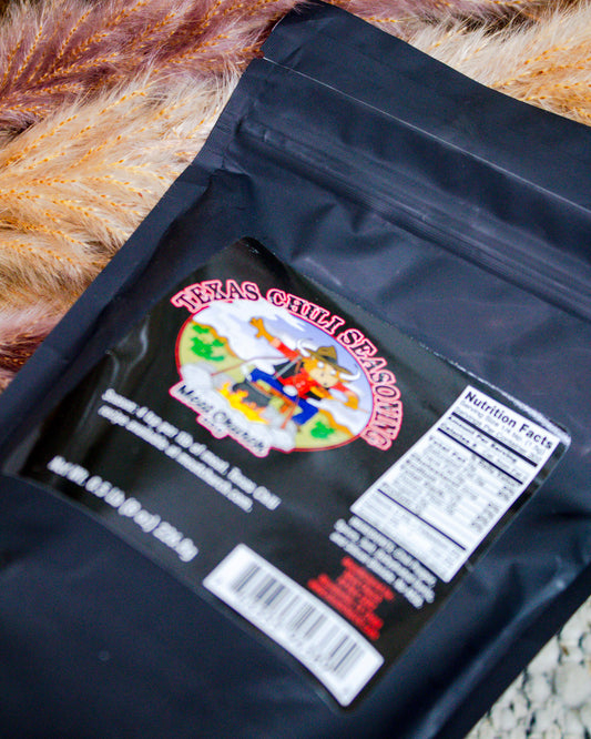 Meat Church Texas Chili Seasoning in black resealable pouch with cowboy graphic and nutrition label—bold, authentic flavor at Makenzie Layne Boutique