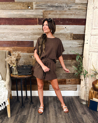 Women’s chocolate brown textured matching shorts set featuring a relaxed short sleeve top and drawstring waist shorts for an effortless casual outfit.